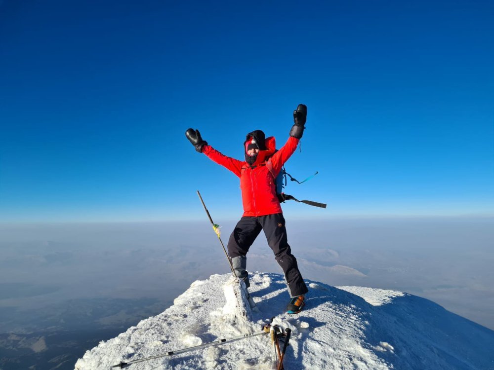 Inga Ecker at the summit of Mount Ararat during strong winds at 5137m.